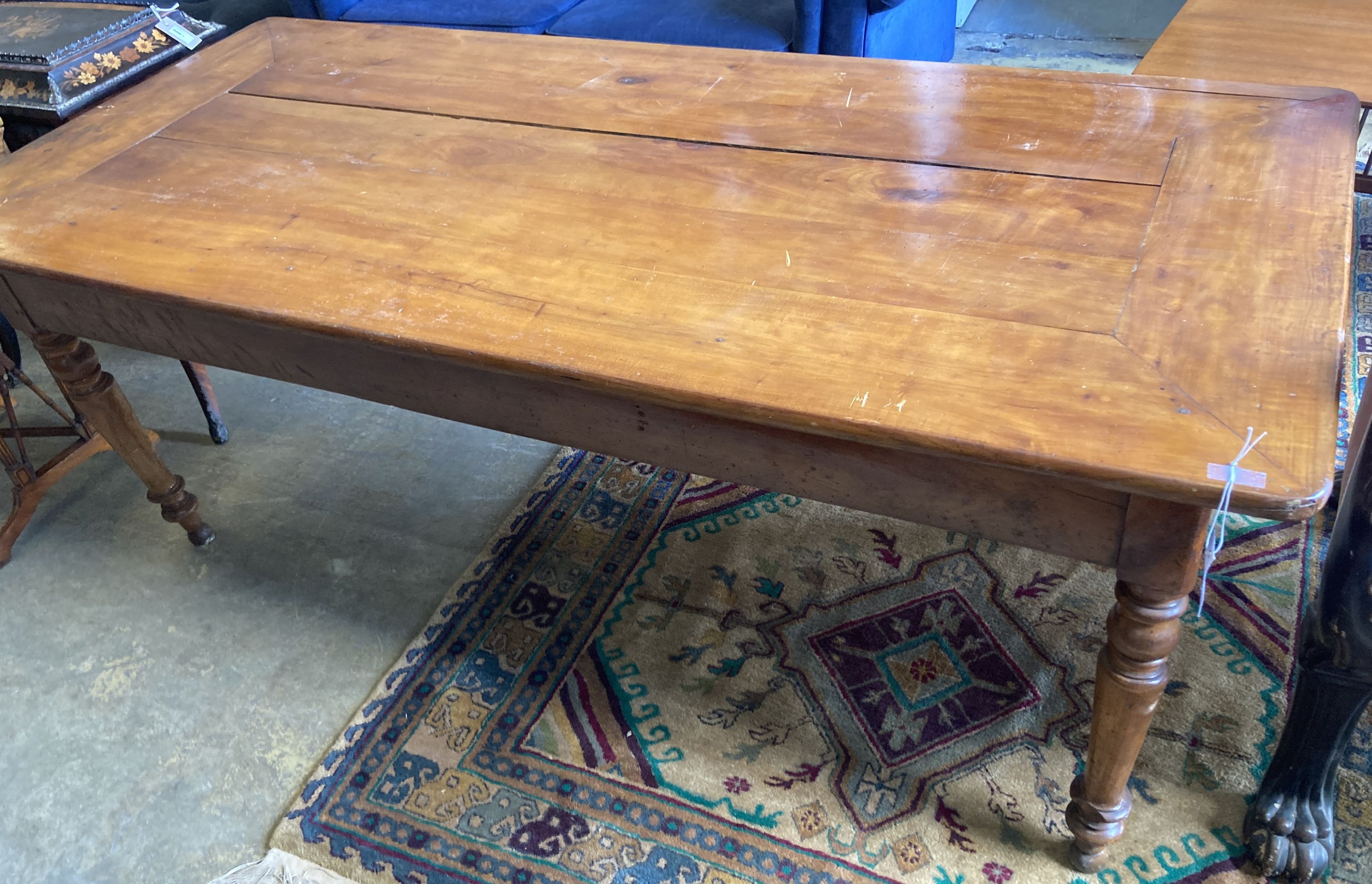 A 19th century French cherry farmhouse table, length 183cm, depth 82cm, height 73cm